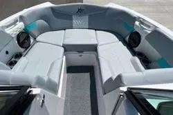 Slide: The Image of 2025 MasterCraft XT22 boat interior with spacious seating and modern design. - 5