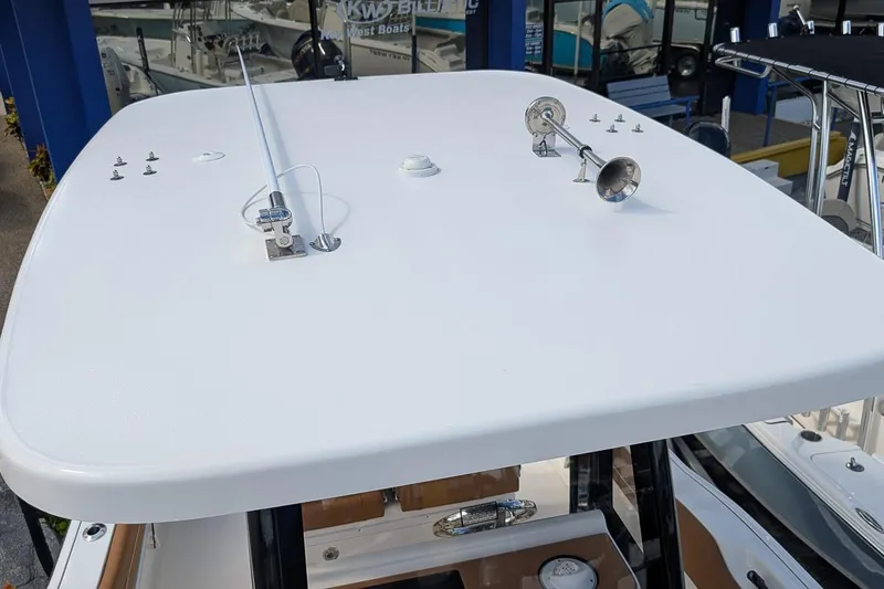 Slide: The Image of Rooftop view of 2026 Key West 239 FSR boat with antenna and horn. - 22