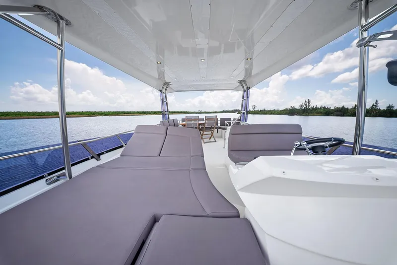 Slide: The Image of Luxurious 2017 Prestige 560 Flybridge yacht interior with scenic water view. - 27