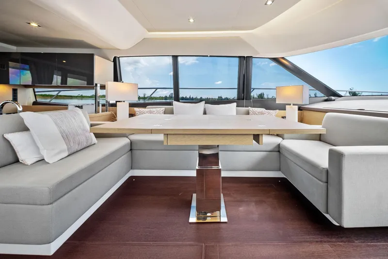 Slide: The Image of Luxurious interior of 2017 Prestige 560 Flybridge yacht with elegant seating and table. - 39