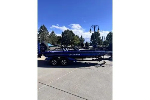 The Image of 2022 Phoenix 921 ELITE boat parked outdoors on a sunny day. - 0