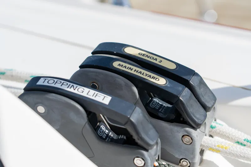 Slide: The Image of Helm of 2016 Leopard 44 Owners Version catamaran with clear sky and water view. - 19