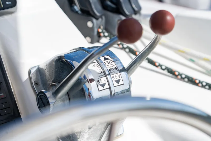 Slide: The Image of Helm of 2016 Leopard 44 Owners Version catamaran with scenic waterway view. - 21