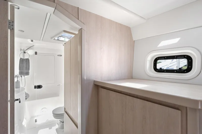 Slide: The Image of 2016 Leopard 44 Owners Version catamaran with spacious deck and seating area. - 31