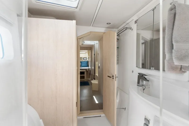 Slide: The Image of Spacious interior of 2016 Leopard 44 Owners Version catamaran with dining area and scenic windows. - 33