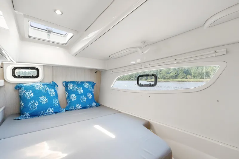 Slide: The Image of Luxurious interior of 2016 Leopard 44 Owners Version catamaran with modern kitchen and seating area. - 37