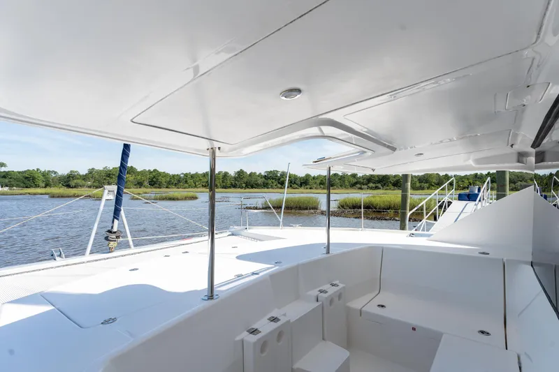 Slide: The Image of 2016 Leopard 44 Owners Version yacht interior, featuring a cozy cabin with a scenic window view. - 46