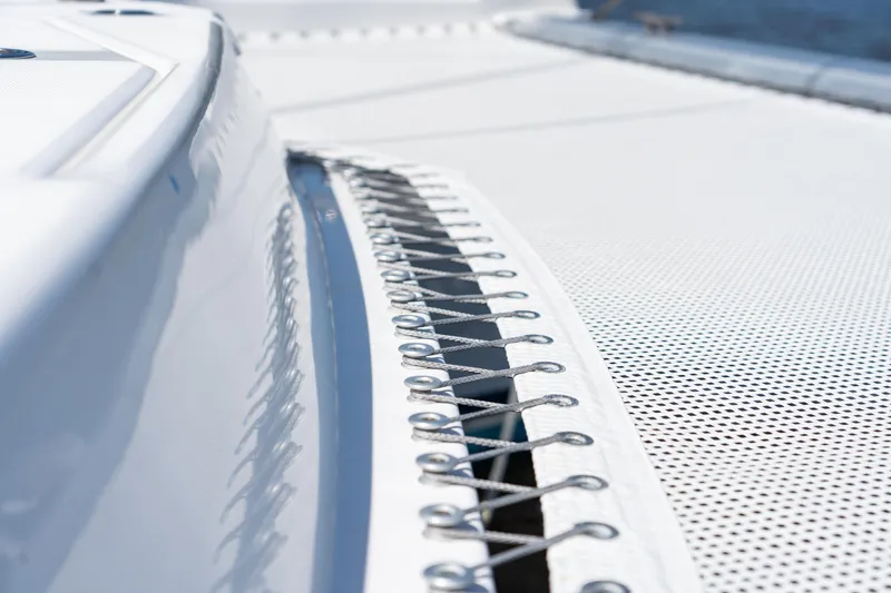 Slide: The Image of 2016 Leopard 44 Owners Version interior with modern light wood finish and compact design. - 49