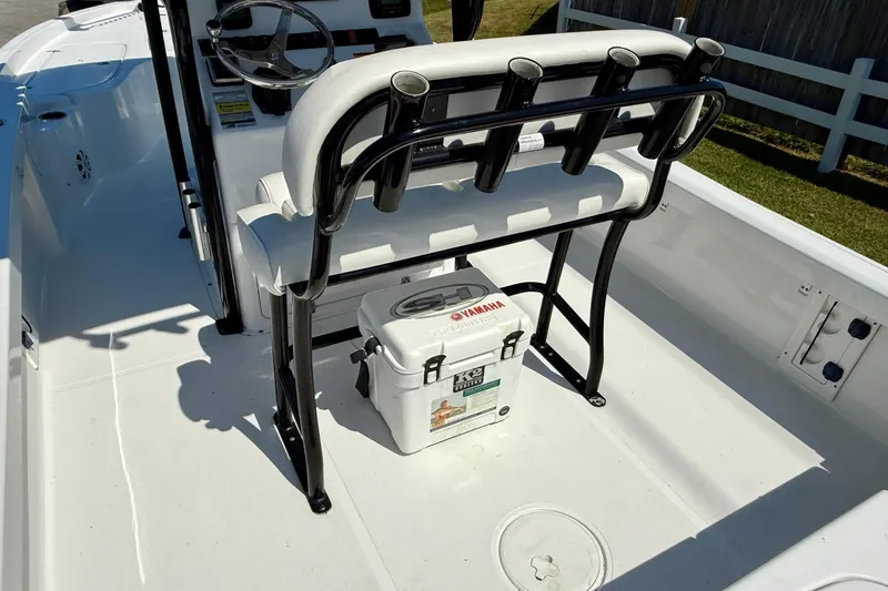 Slide: The Image of 2015 Sea Hunt RZR 24 boat interior with seating and Yamaha cooler. - 9