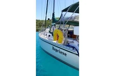 Slide: The Image of Sailboat "Reprieve" on turquoise water, 1999 Caliber 40LRC model. - 11