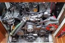 Slide: The Image of Engine compartment of a 1999 Caliber 40LRC sailboat, showcasing mechanical components. - 33