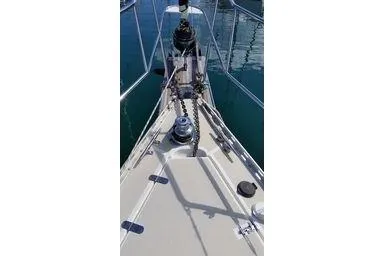 Slide: The Image of 1999 Caliber 40LRC sailboat deck with anchor and winch system. - 35