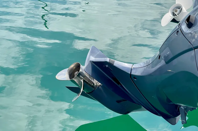 Slide: The Image of Close-up of a Parker 2520 XL Sport Cabin boat propeller in clear water. - 11