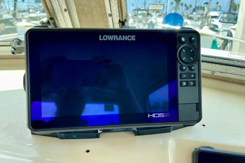 Slide: The Image of Lowrance HDS9 marine display on 2002 Parker 2520 XL Sport Cabin boat dashboard. - 15