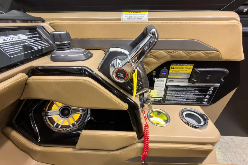 Slide: The Image of Control panel of 2026 Godfrey Sanpan 27' Tritoon with joystick and speaker. - 26