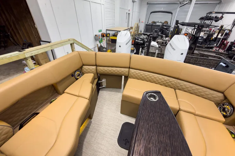 Slide: The Image of Luxurious interior of 2026 Godfrey Sanpan 27' Tritoon with tan seating and modern design. - 40
