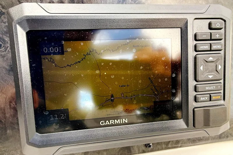 Slide: The Image of Control panel of 2023 G3 BOATS Select 18F with switches and horn button. - 11