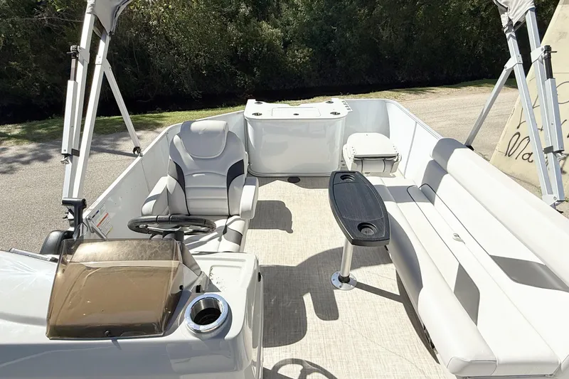 Slide: The Image of 2023 G3 BOATS Select 18F interior with seating and fishing setup. - 14