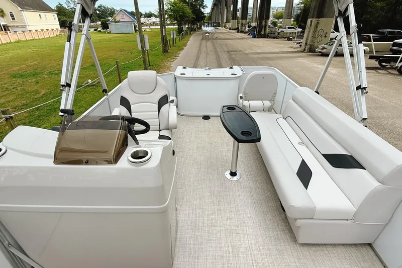Slide: The Image of 2023 G3 BOATS Select 18F interior with two white swivel seats. - 17
