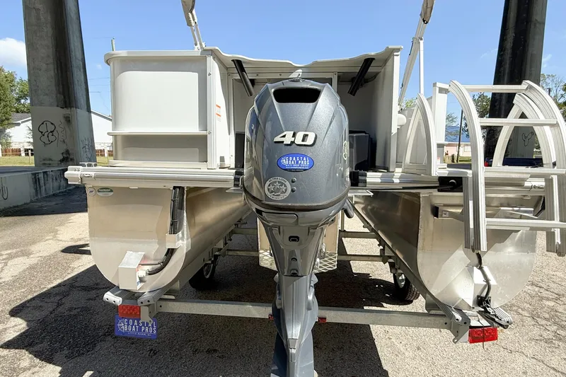 Slide: The Image of 2023 G3 BOATS Select 18F pontoon on trailer, parked outdoors. - 5