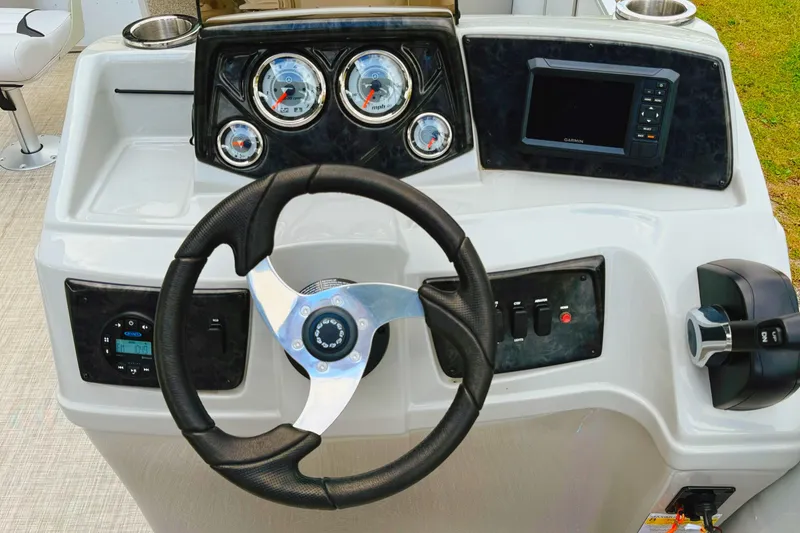 Slide: The Image of 2023 G3 BOATS Select 18F with 40HP motor, parked under a bridge. - 7