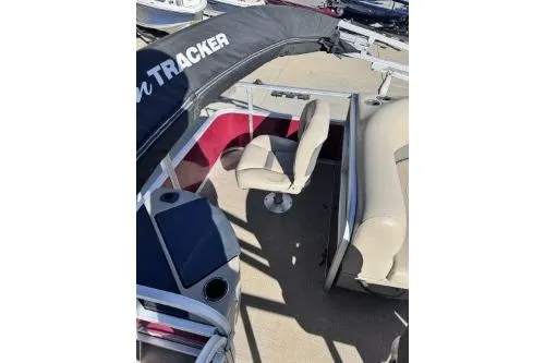 Slide: The Image of 2022 Sun Tracker Bass Buggy 18 DLX interior with seating and canopy. - 4