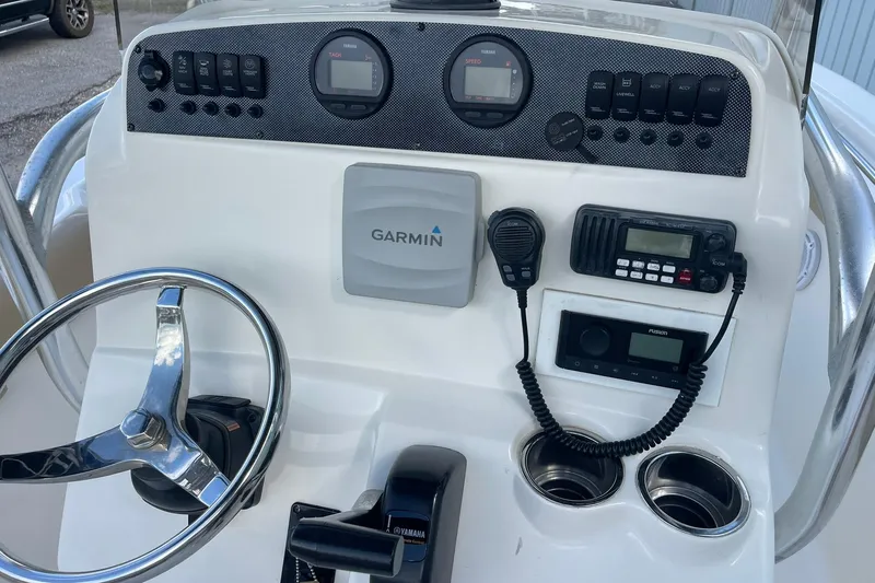 Slide: The Image of Control panel of a 2014 Pioneer 197 Islander boat with Garmin navigation system. - 15