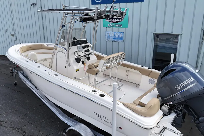Slide: The Image of 2014 Pioneer 197 Islander boat with Yamaha engine, parked on a trailer. - 3