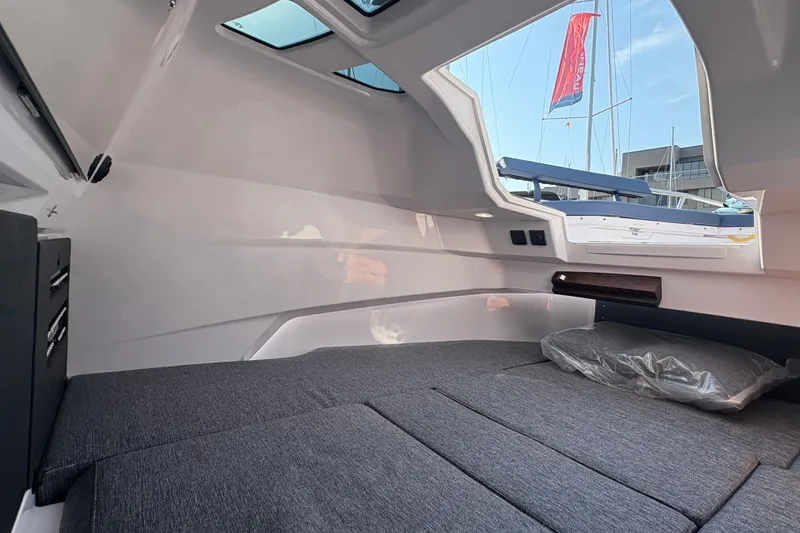 Slide: The Image of Interior cabin of 2025 Axopar 29 XC Cross Cabin, featuring modern design and comfortable seating. - 17