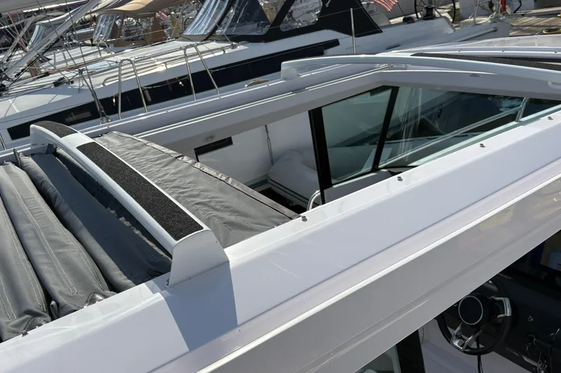 Slide: The Image of 2025 Axopar 29 XC Cross Cabin boat with sleek design and modern features. - 44