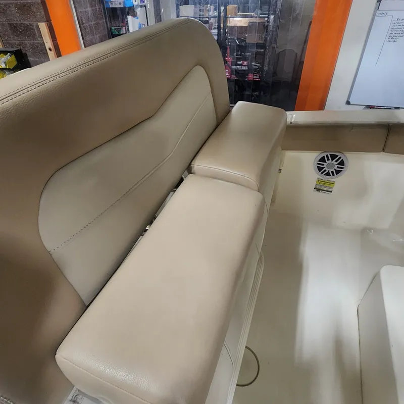 Slide: The Image of Interior view of 2023 Scout 215 XSF with beige seating. - 19