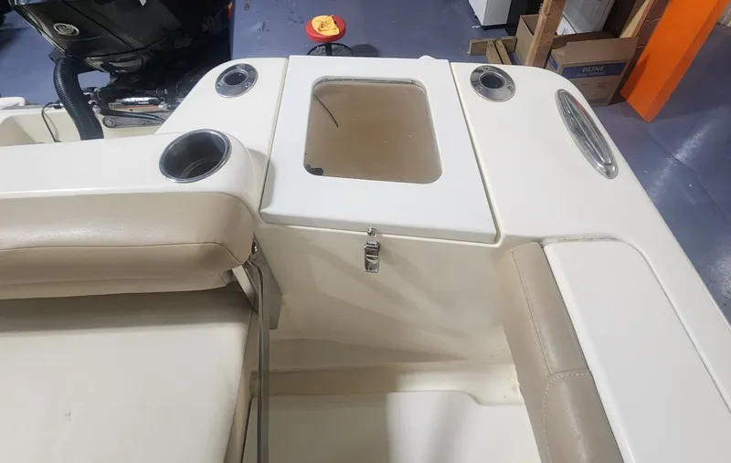 Slide: The Image of Interior view of 2023 Scout 215 XSF boat with seating area. - 38