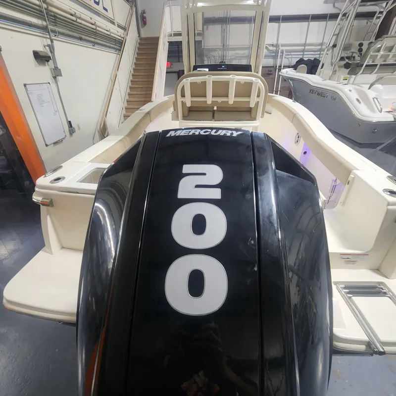 Slide: The Image of Scout 215 XSF 2023 with Mercury 200 HP engine indoors. - 5