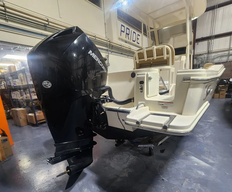 Slide: The Image of 2023 Scout 215 XSF boat with Mercury outboard motor. - 7