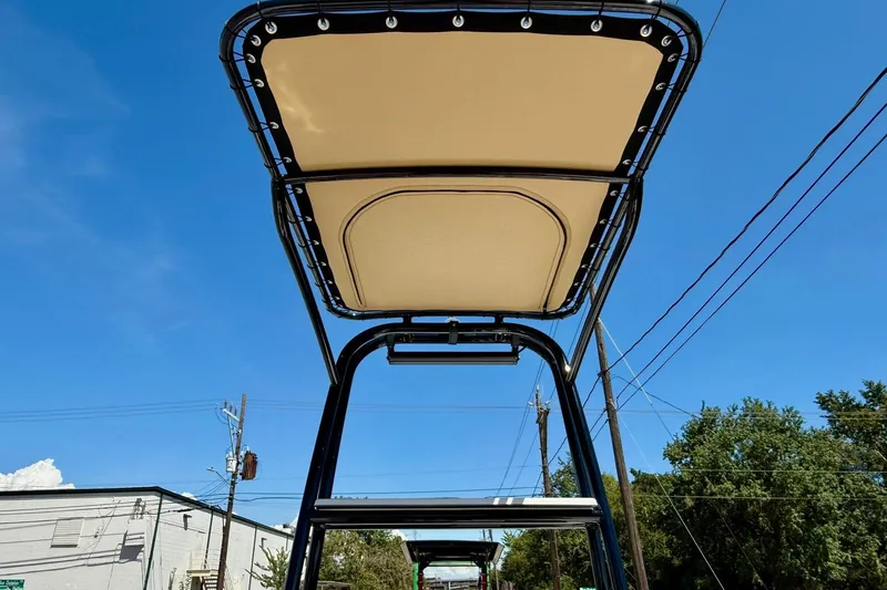 Slide: The Image of 2024 SCB S22 boat canopy against a clear blue sky. - 11