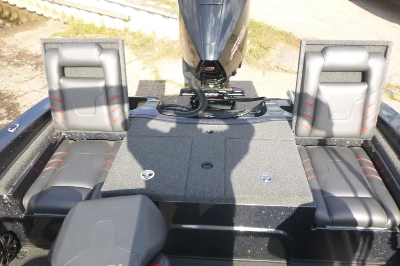 Slide: The Image of 2023 Nitro ZV19 Sport Pro boat interior with seating and motor. - 17
