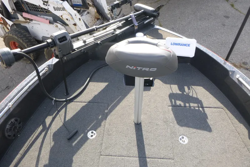 Slide: The Image of 2023 Nitro ZV19 Sport Pro boat deck with Lowrance equipment and seating. - 8