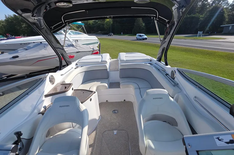 Slide: The Image of 2013 Rinker 276 Captiva Bowrider interior with plush seating and modern design. - 19