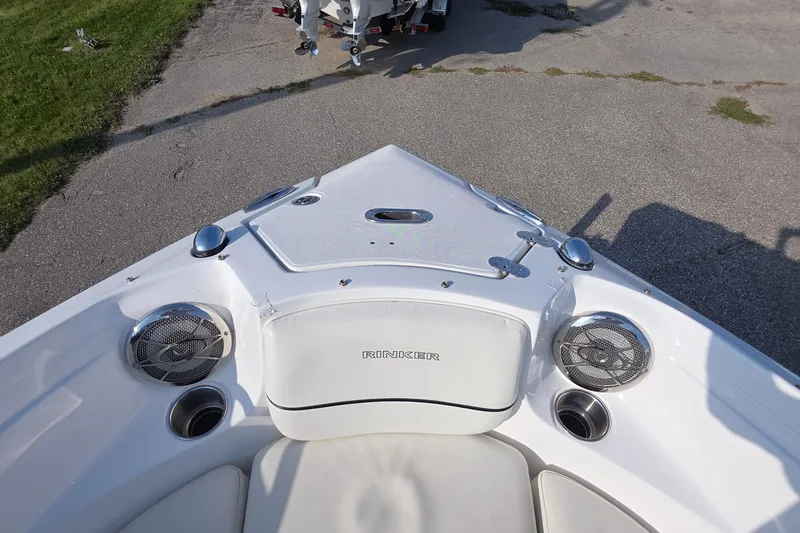 Slide: The Image of 2013 Rinker 276 Captiva Bowrider boat bow with speakers and seating. - 20