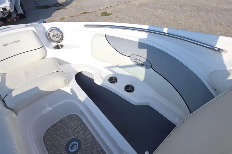 Slide: The Image of 2013 Rinker 276 Captiva Bowrider interior with seating and speaker detail. - 33
