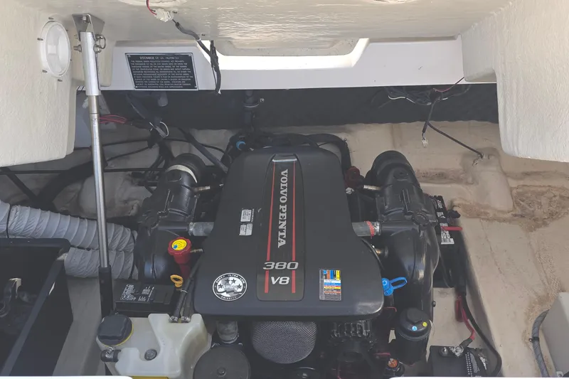 Slide: The Image of Engine compartment of 2013 Rinker 276 Captiva Bowrider with Volvo Penta 380 V8 engine. - 46
