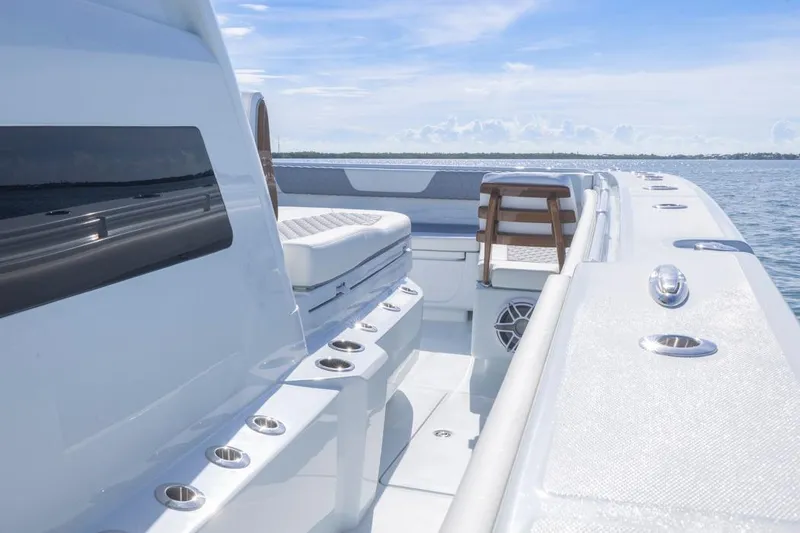Slide: The Image of 2026 Invincible 46 Catamaran deck with seating, ocean view, and sleek design. - 28