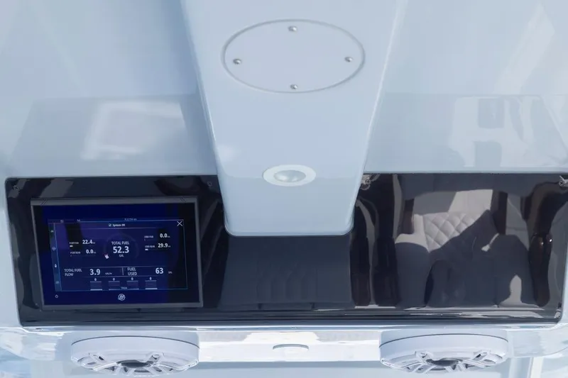 Slide: The Image of Dashboard of 2026 Invincible 46 Catamaran with digital display and speakers. - 34