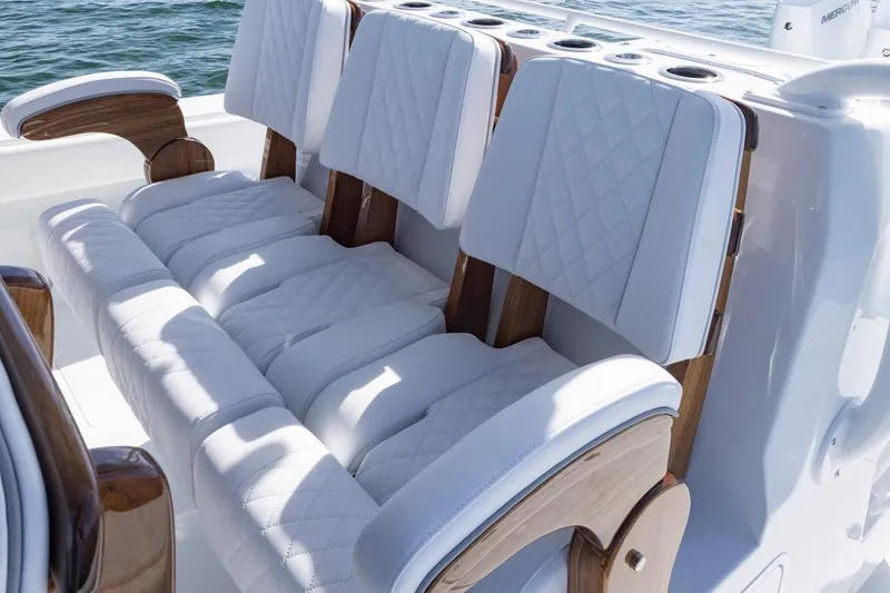 Slide: The Image of Luxurious seating on 2026 Invincible 46 Catamaran with quilted white upholstery. - 40