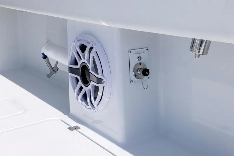 Slide: The Image of 2026 Invincible 46 Catamaran deck detail with speaker and hose. - 65