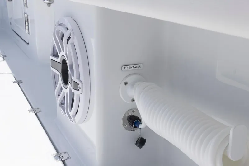 Slide: The Image of Close-up of 2026 Invincible 46 Catamaran's freshwater hose and speaker system. - 67