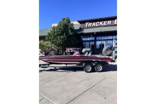 The Image of 2017 Skeeter FX21 boat on trailer outside Tracker Boats store. - 1