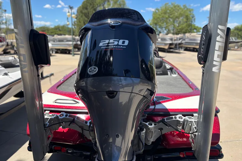 Slide: The Image of 2017 Skeeter FX21 boat with a 250 horsepower engine, docked outdoors. - 8