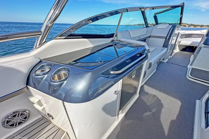 Slide: The Image of 2018 Formula 350 FX Crossover Bowrider interior with sleek seating and modern amenities. - 16