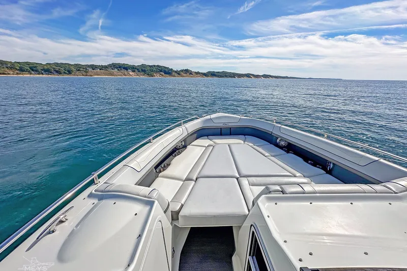 Slide: The Image of 2018 Formula 350 FX Crossover Bowrider on serene ocean waters, showcasing spacious seating. - 19